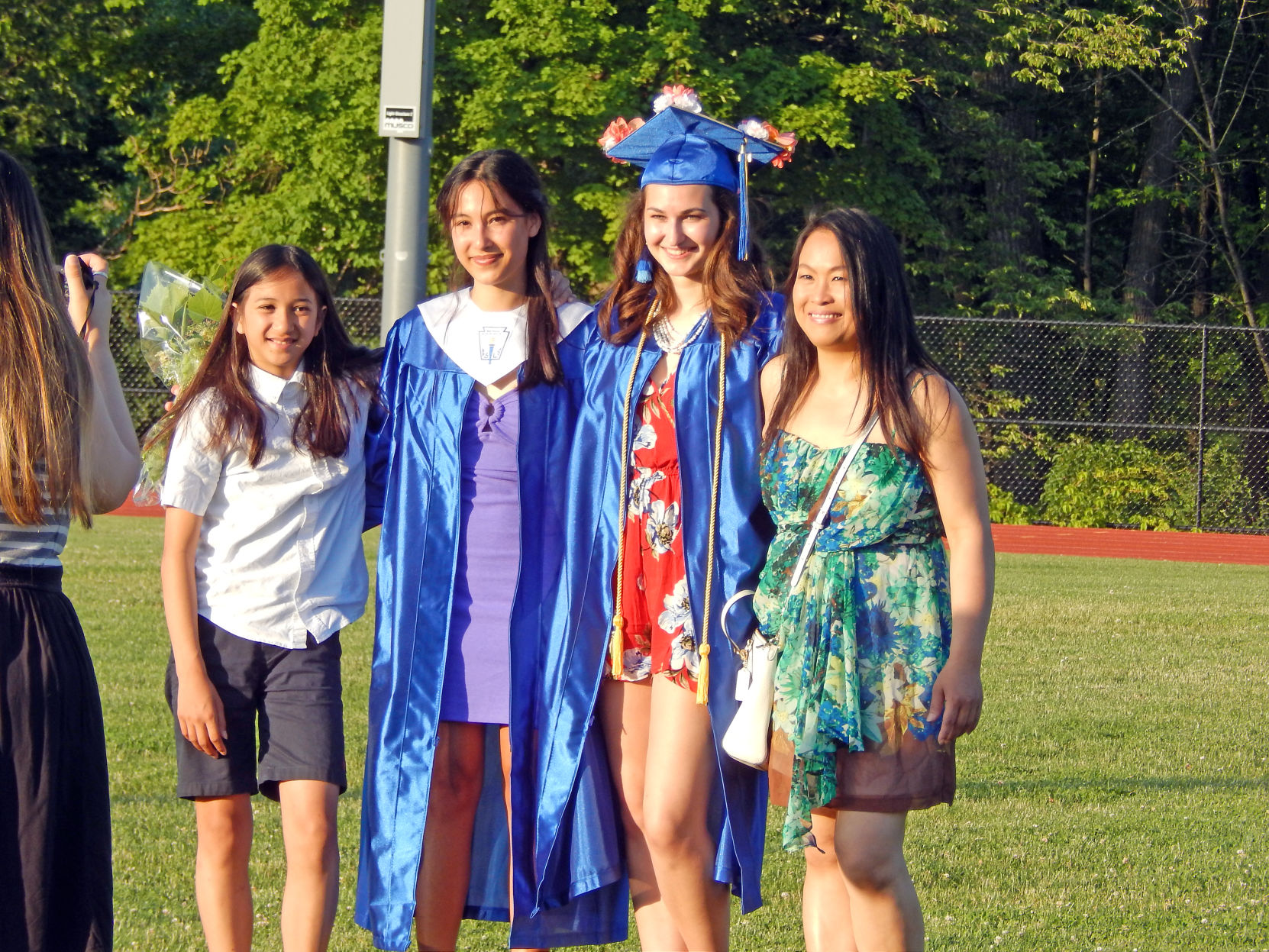Class of 2019 Charles O. Dickerson graduates Lenna Georgiadis (second from left) and Elise Murray pose with Georgiadis’ sister, Skye Georgiadis (far left), and mother, Yupawan Georgiadis, after graduation June 27.